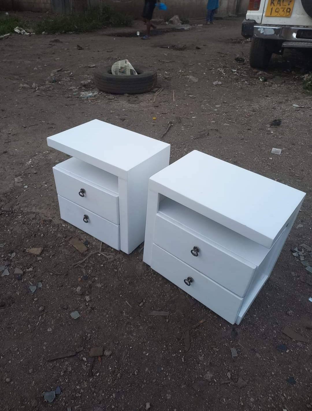 Pair of white two-drawer bedside tables