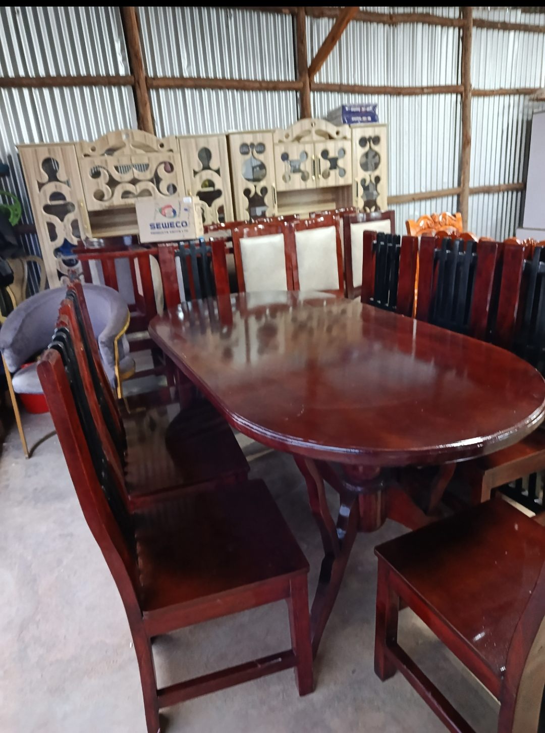 Showroom dining sets with matching display cabinets