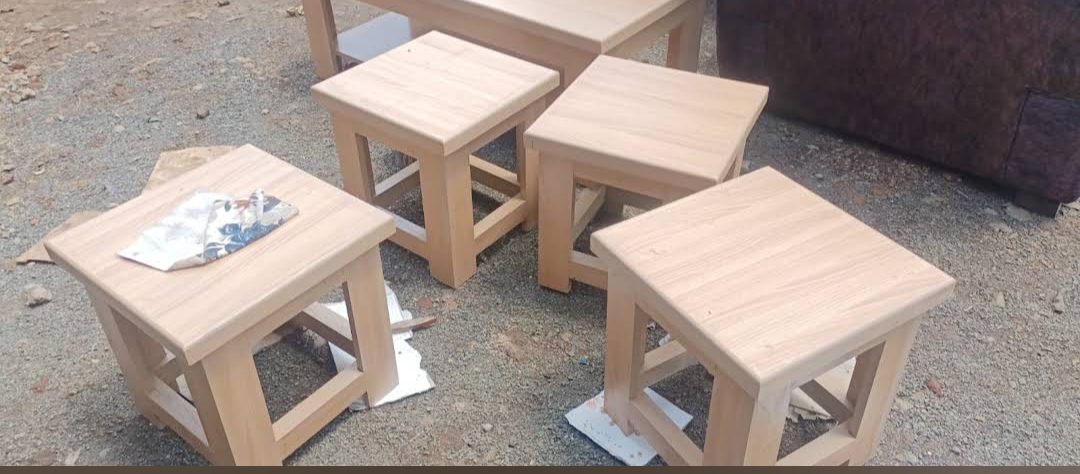 A set of natural-wood nesting stools